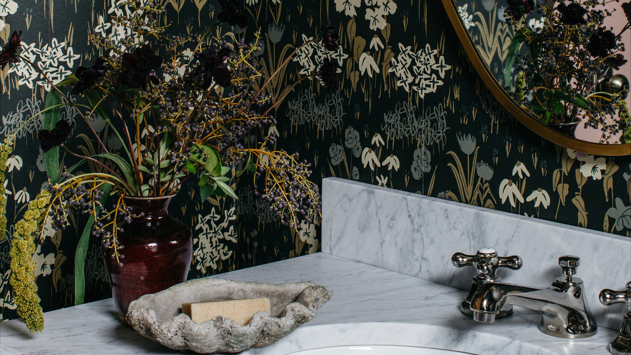 moody floral wallpaper for bathrooms byHopeatHome
